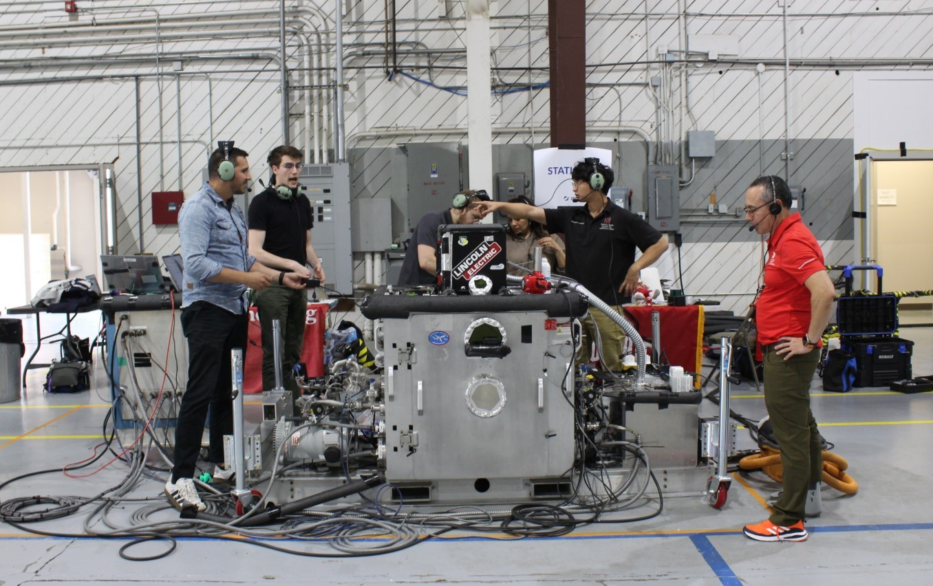 team working in hanger