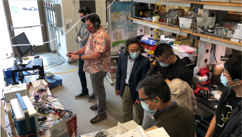 A lab demonstration of the hybrid fuel cell – battery/capacitor power source for UASs conducted at Dr.Du’s Fuel Cell Laboratory at Kent State University’s Kent Campus. The team completed a successful demonstration of 12-hours of operation of the technology. Principal Investigator Dr. Yanhai Du and Lab Demonstration Lead Dr. Blake Stringer are pictured at the center. 