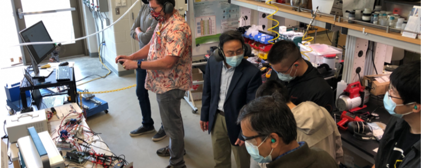 A lab demonstration of the hybrid fuel cell – battery/capacitor power source for UASs conducted at Dr.Du’s Fuel Cell Laboratory at Kent State University’s Kent Campus. The team completed a successful demonstration of 12-hours of operation of the technology. Principal Investigator Dr. Yanhai Du and Lab Demonstration Lead Dr. Blake Stringer are pictured at the center. 